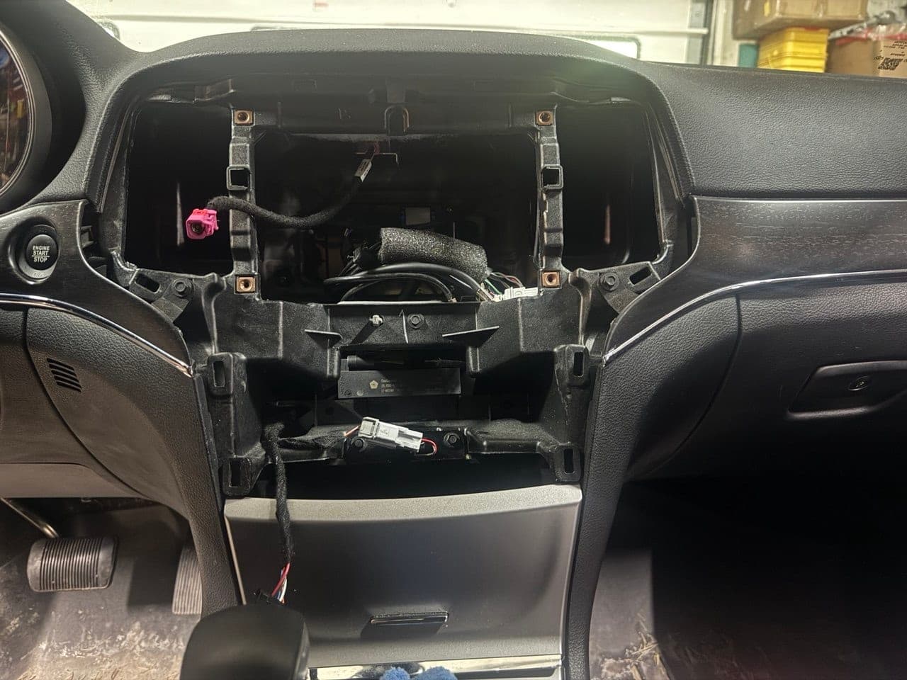 Factory radio and display assembly removed from the dash