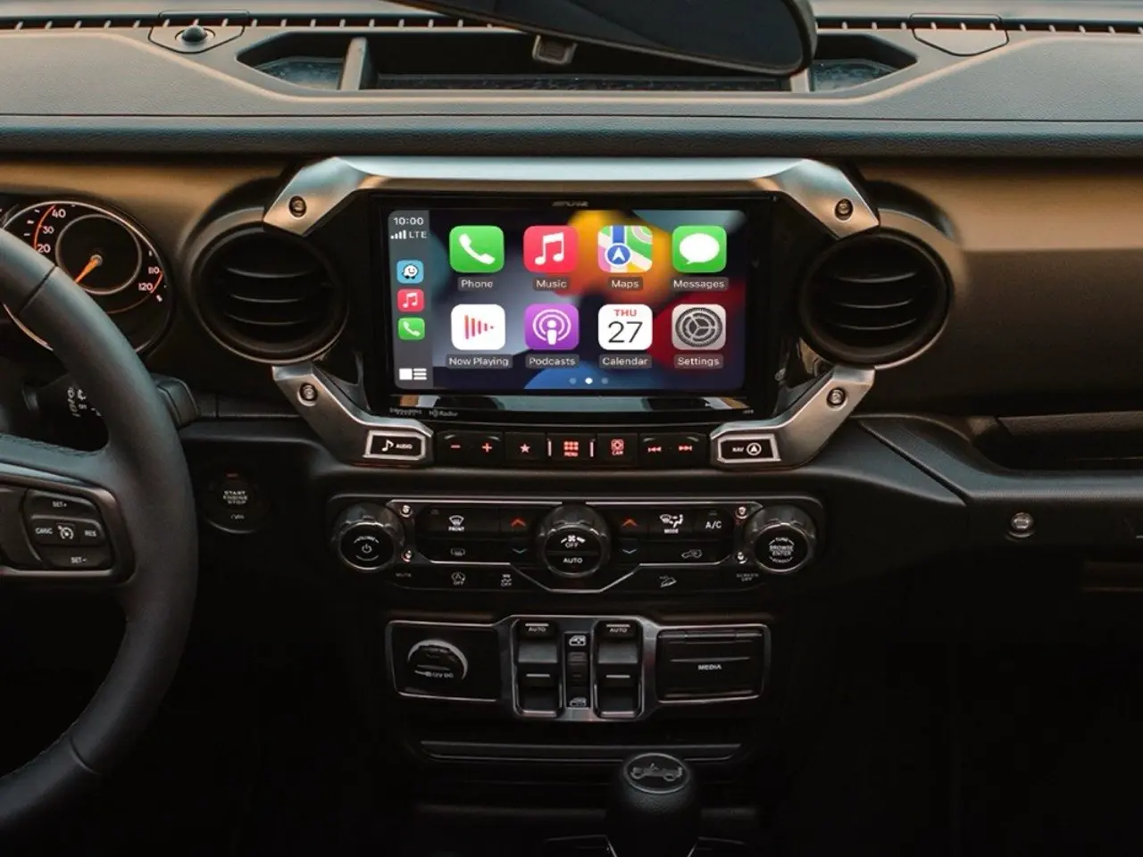Apple CarPlay running on an upgraded Jeep dash