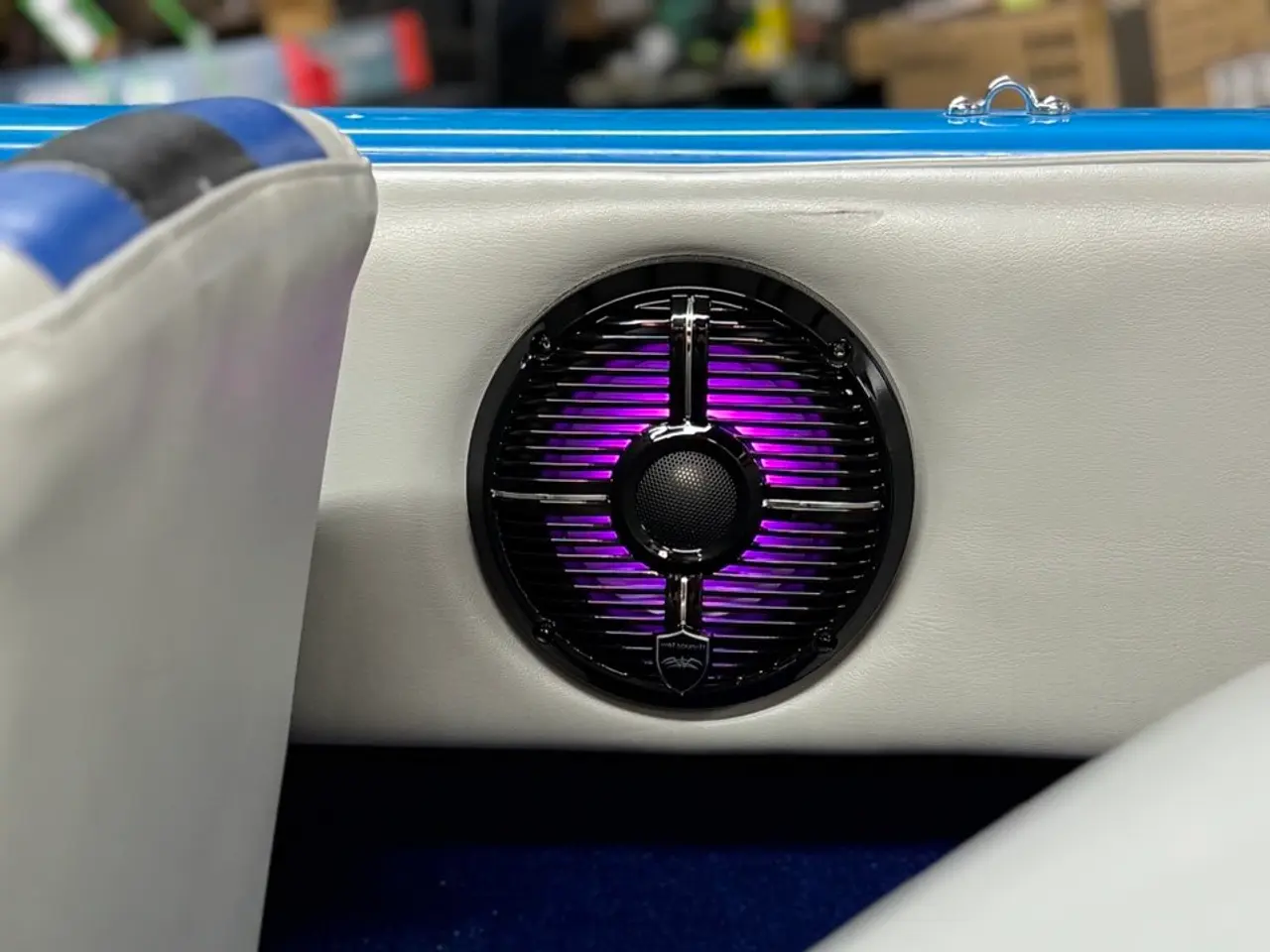 Boat cockpit speaker glowing with purple accent lighting